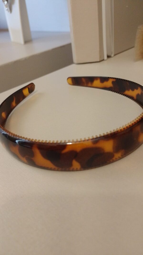 Tiaras acetato G